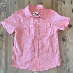 Boys Melon colored casual button up. Light weight worn for a picture.